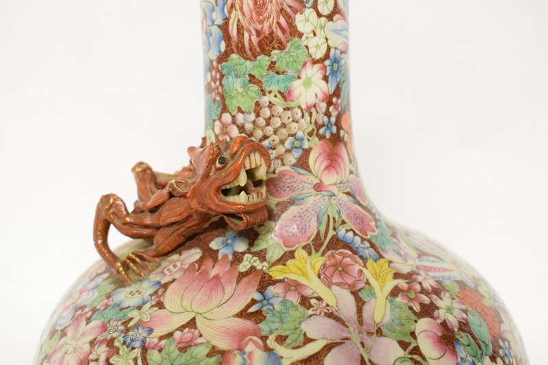 A dragon on an antique Chinese millefleurs vase