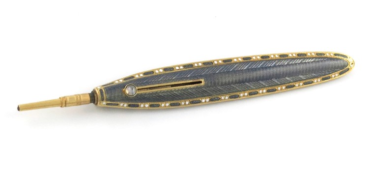 A French gold and enamel pencil, by Cartier, Paris. Sold for: £9,000