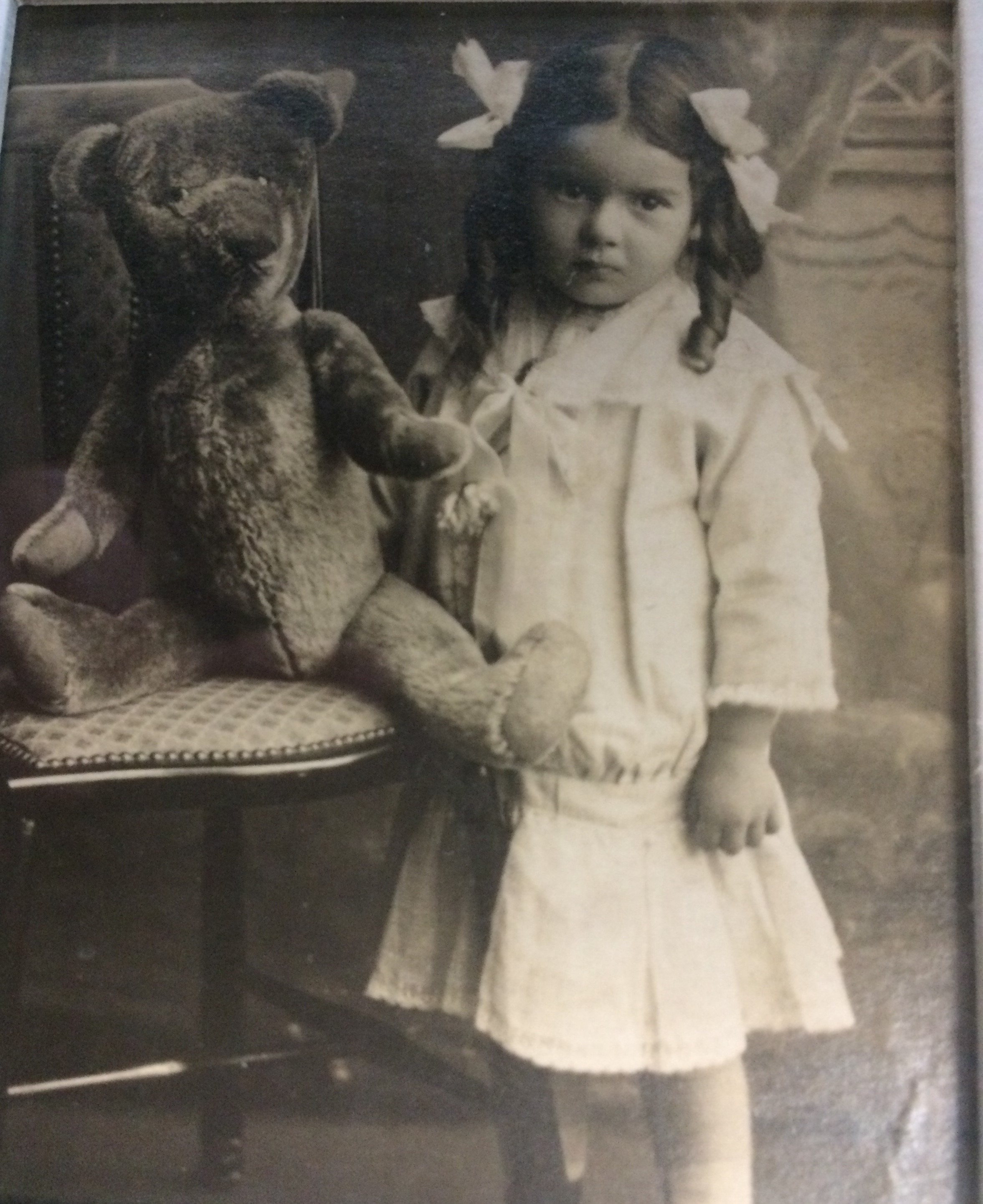 Ida Webb as a child with her vintage teddy bear 