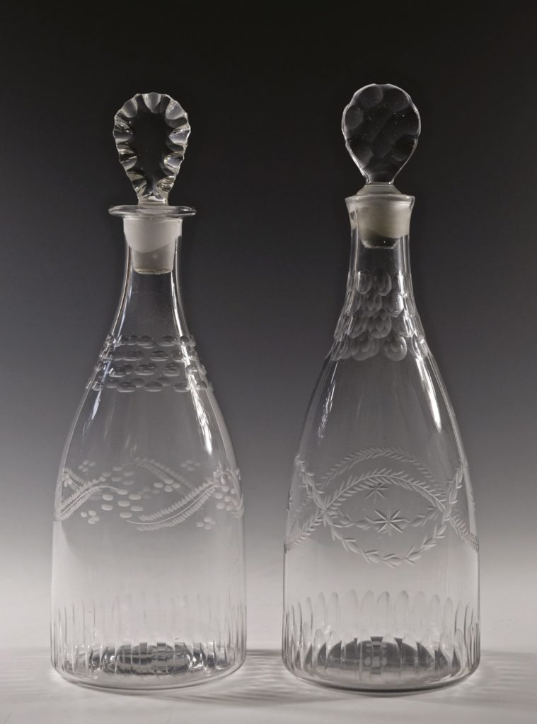 Lozenge stoppers in antique glass decanters