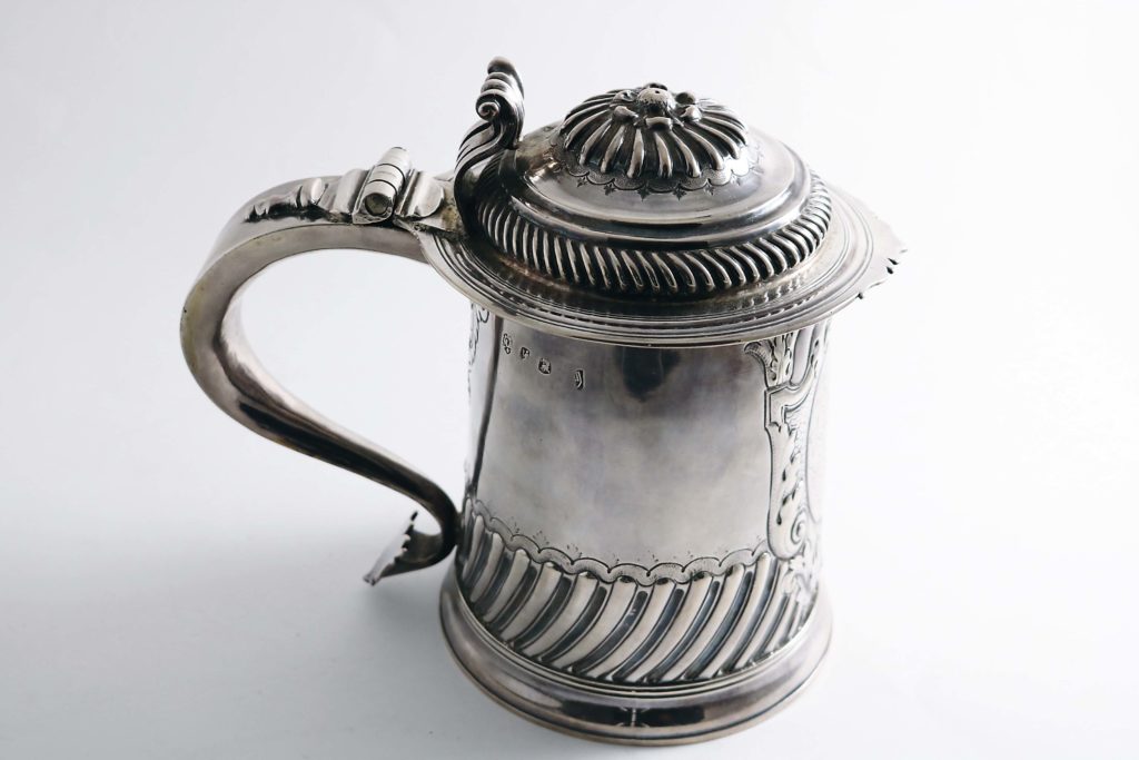 A silver Queen Anne tankard