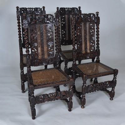 Set of four walnut caned side chairs