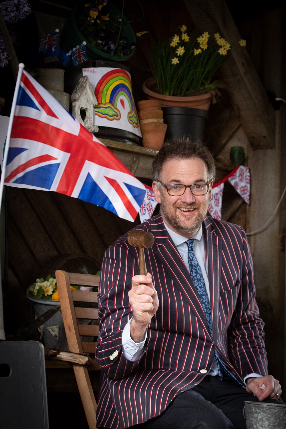 Auctioneer Charles Hanson in his garden shed