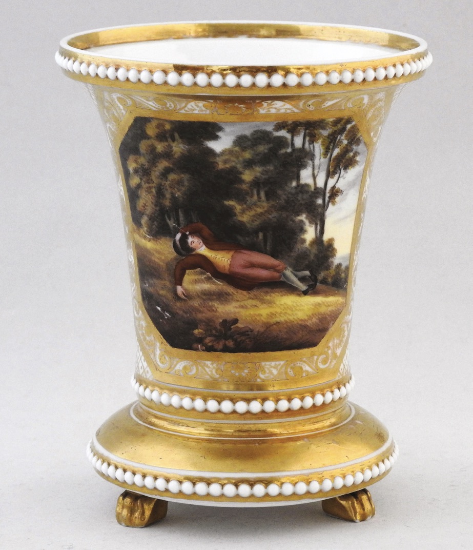 A Spode bone china beaded matchpot on claw feet