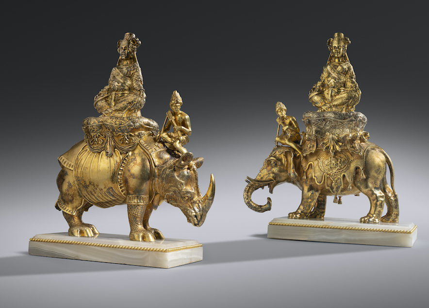 A pair of 19th century continental silver-gilt figures of a rhinoceros and elephant  from the Rothschild's Exbury House