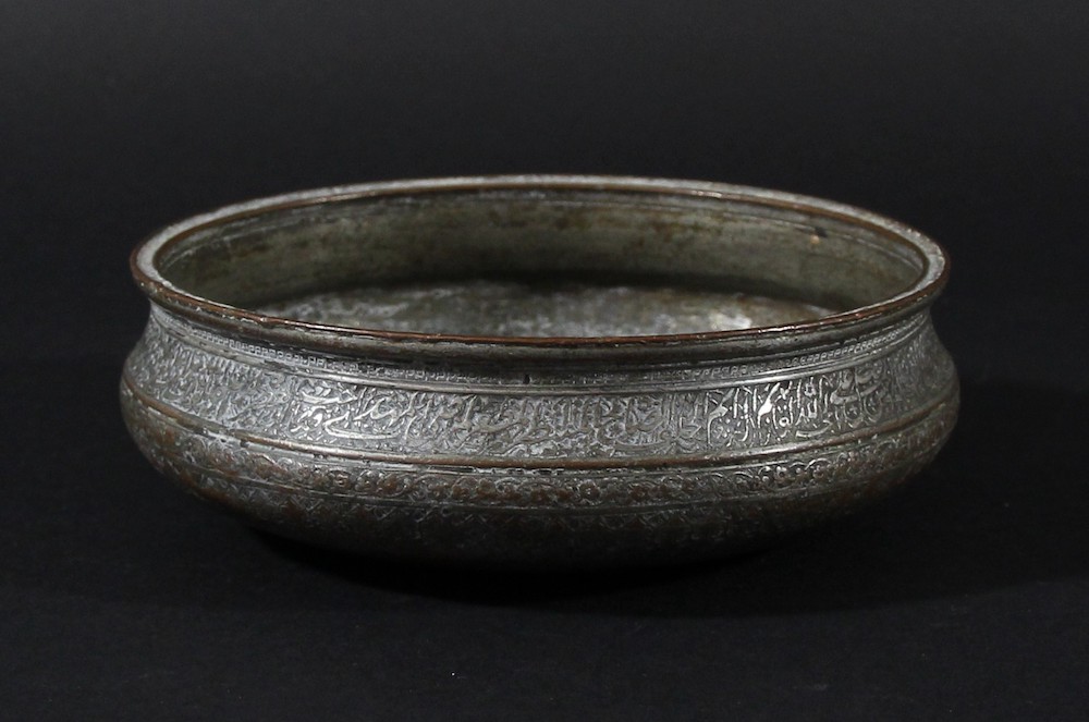 a Persian tinned copper bowl, probably from the time of the Safavid dynasty