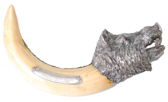 silver mounted wild boar’s tusk cigar-cutter marked Fabergé