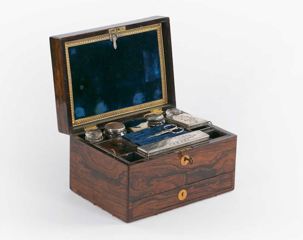 An early 19th Century George III rosewood fitted dressing case