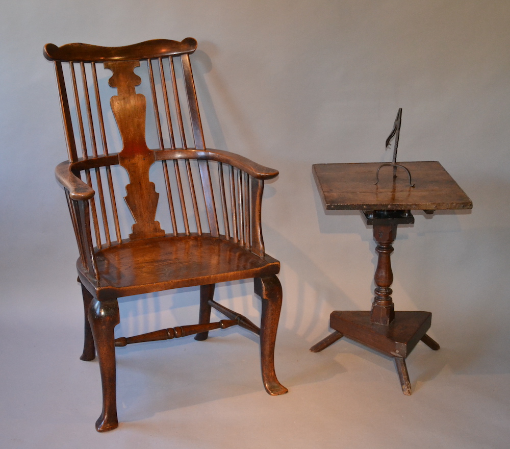 17th-century primitive oak table and a late-Georgian elm comb back chair