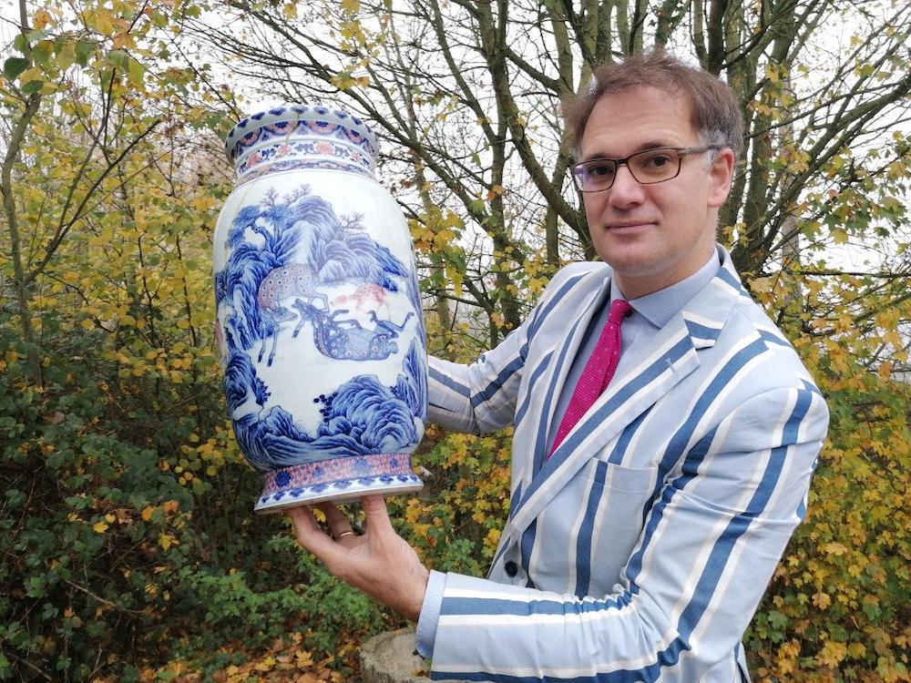 Charles Hanson with an antique Chinese vase