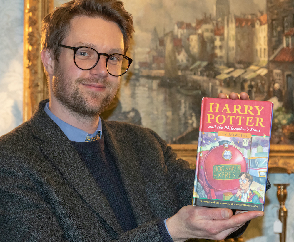 Hansons' Jim Spencer with the Harry Potter first edition