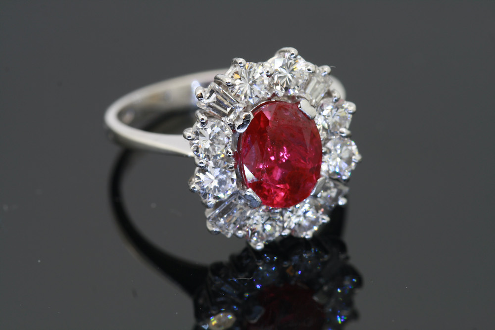 Ruby and Diamond Cluster Ring, set on 18kt white gold, size J. With a 1.6ct ruby and brilliant and baguette cut diamonds. Priced at €7,950, courtesy of J.W. Weldon