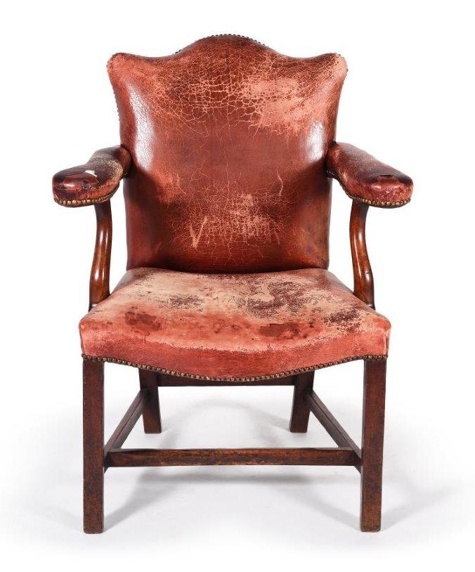 A George III mahogany and leather upholstered armchair