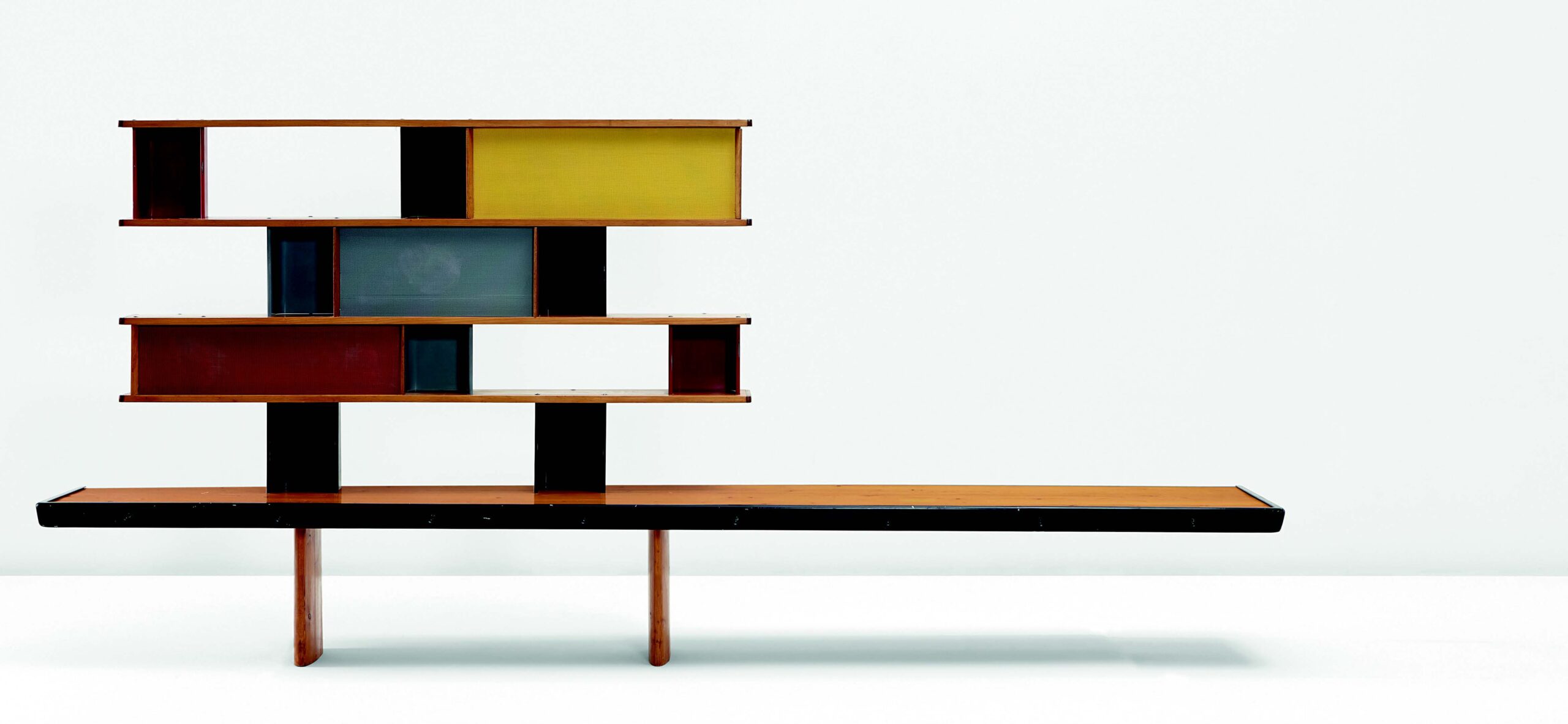 Charlotte Perriand Tunisie bookcase, 1952, in oak, pine, mahogany, aluminium and, painted metal, for the student rooms of La Maison de la Tunisie, Cité Internationale Universitaire de Paris, Sold for £98,500 in 2016. Image courtesy of Phillips