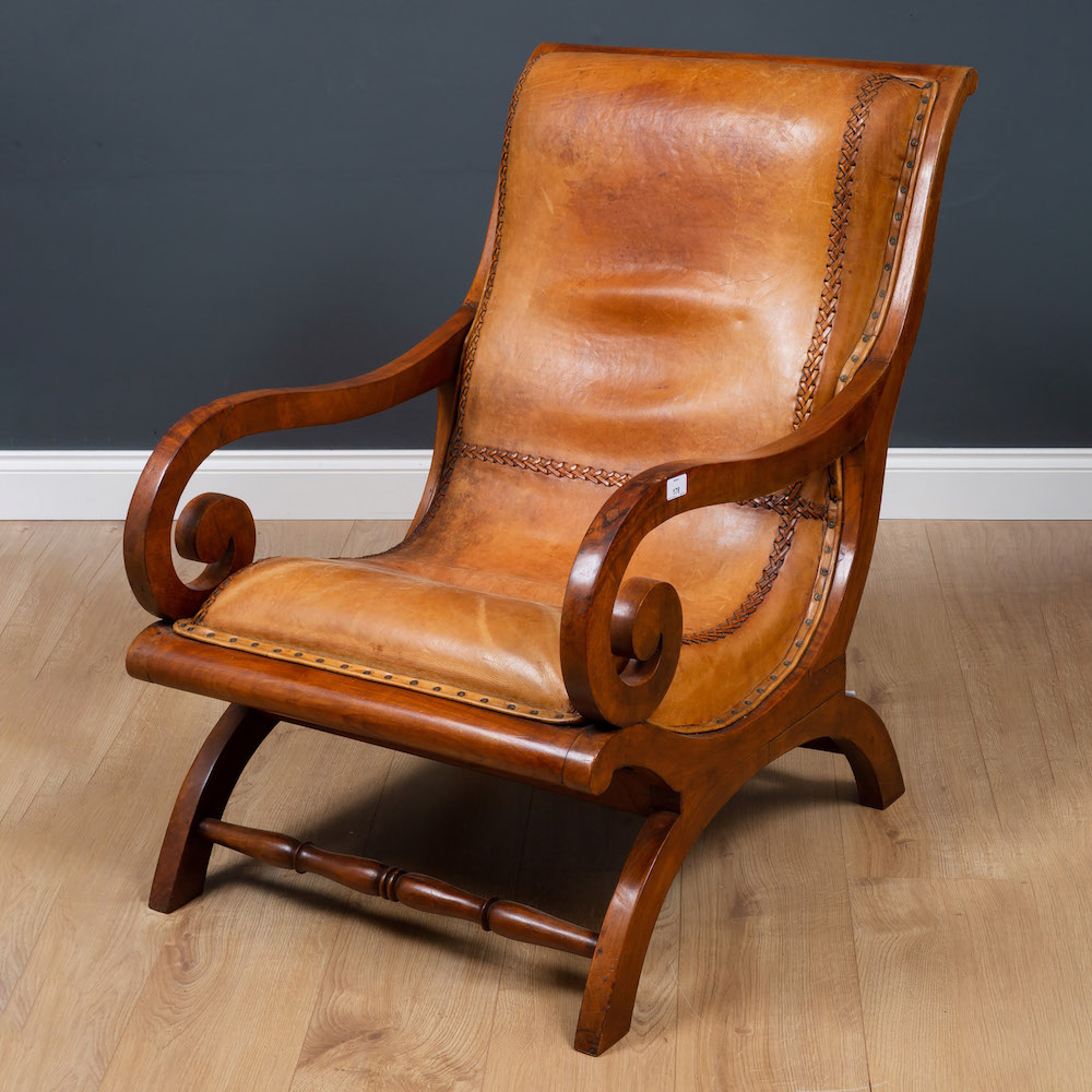 Late Victorian walnut and leather upholstered armchair