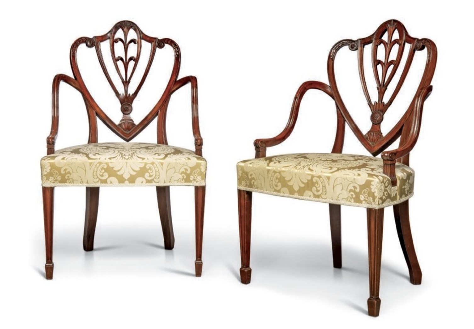 Pair of George III mahogany open armchairs attributed to Gillows