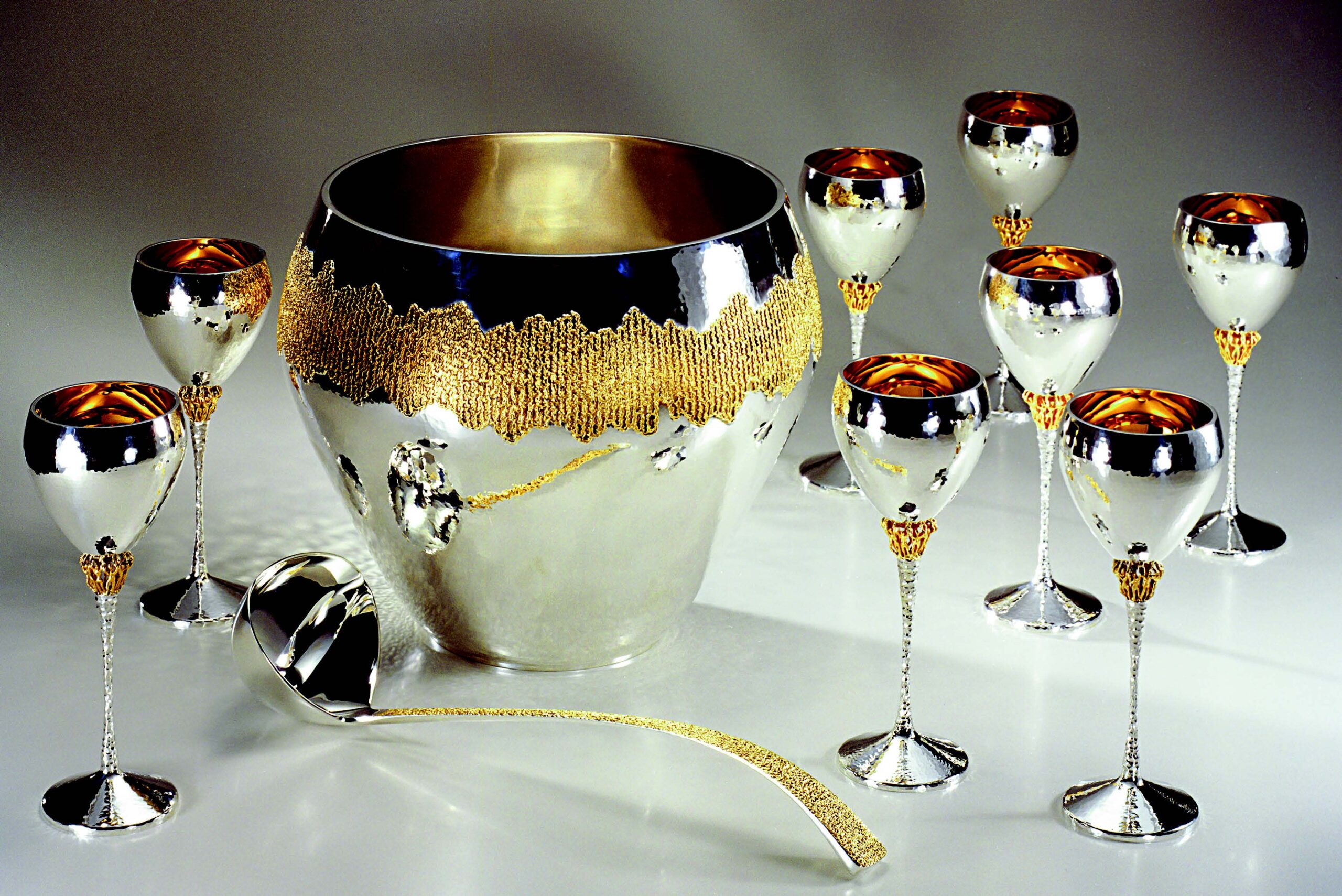 Stuart Devlin (1931-2018), handraised punch bowl and goblets with hand-forged ladle, 1973