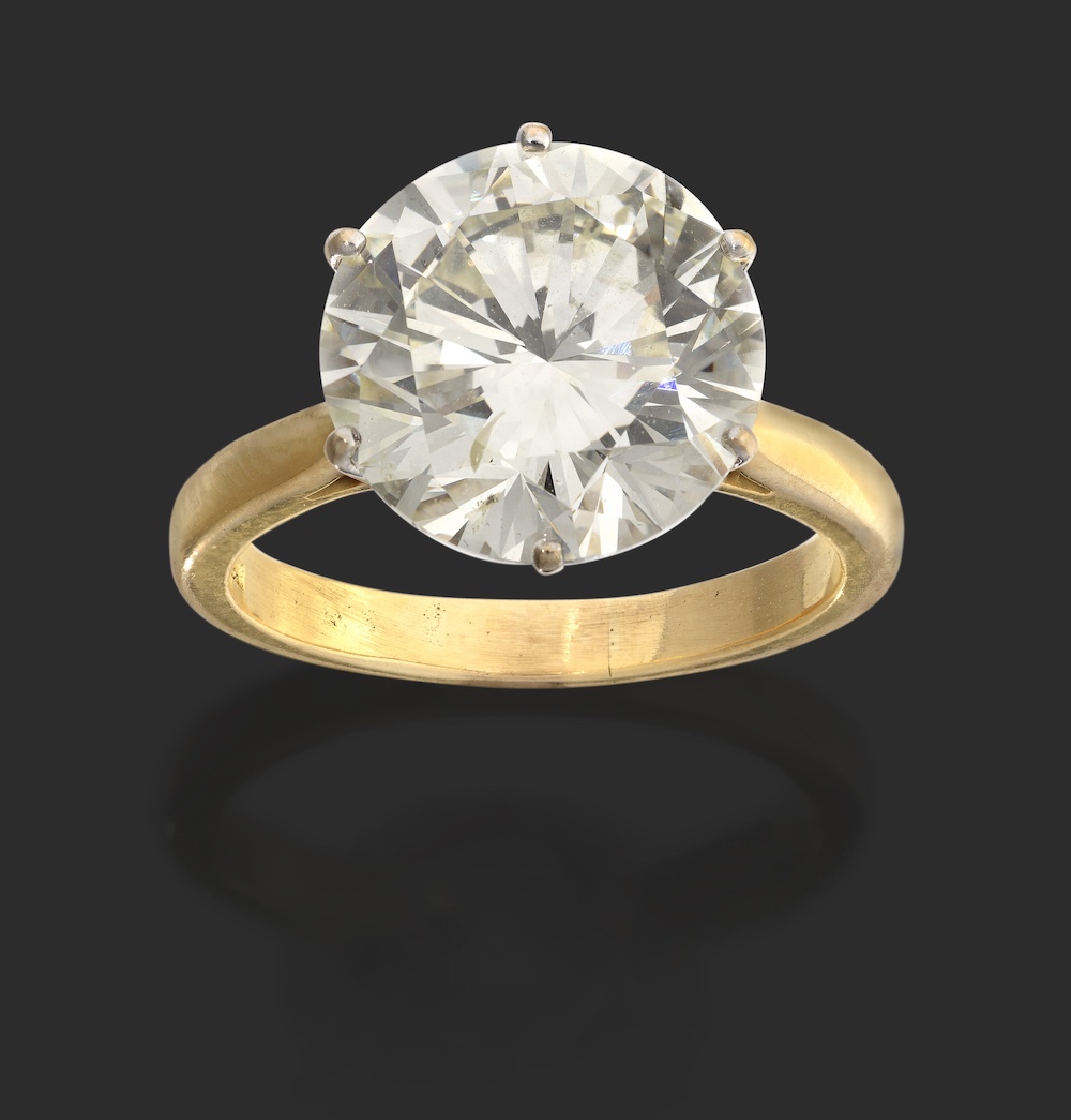 An 18 carat gold diamond solitaire ring