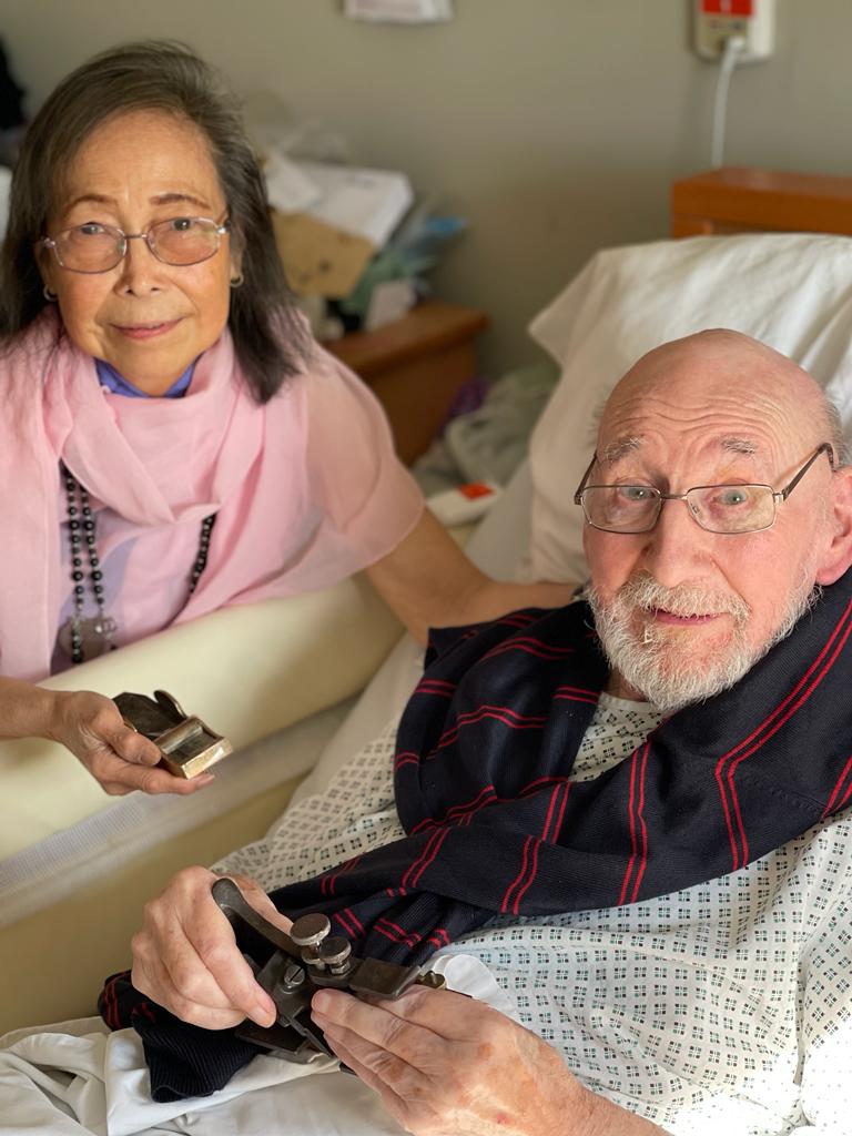 Roy Turnage, holding one of his many planes, with wife Nympha