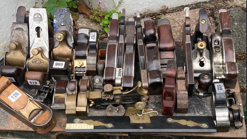 A collection of woodworking planes and tools