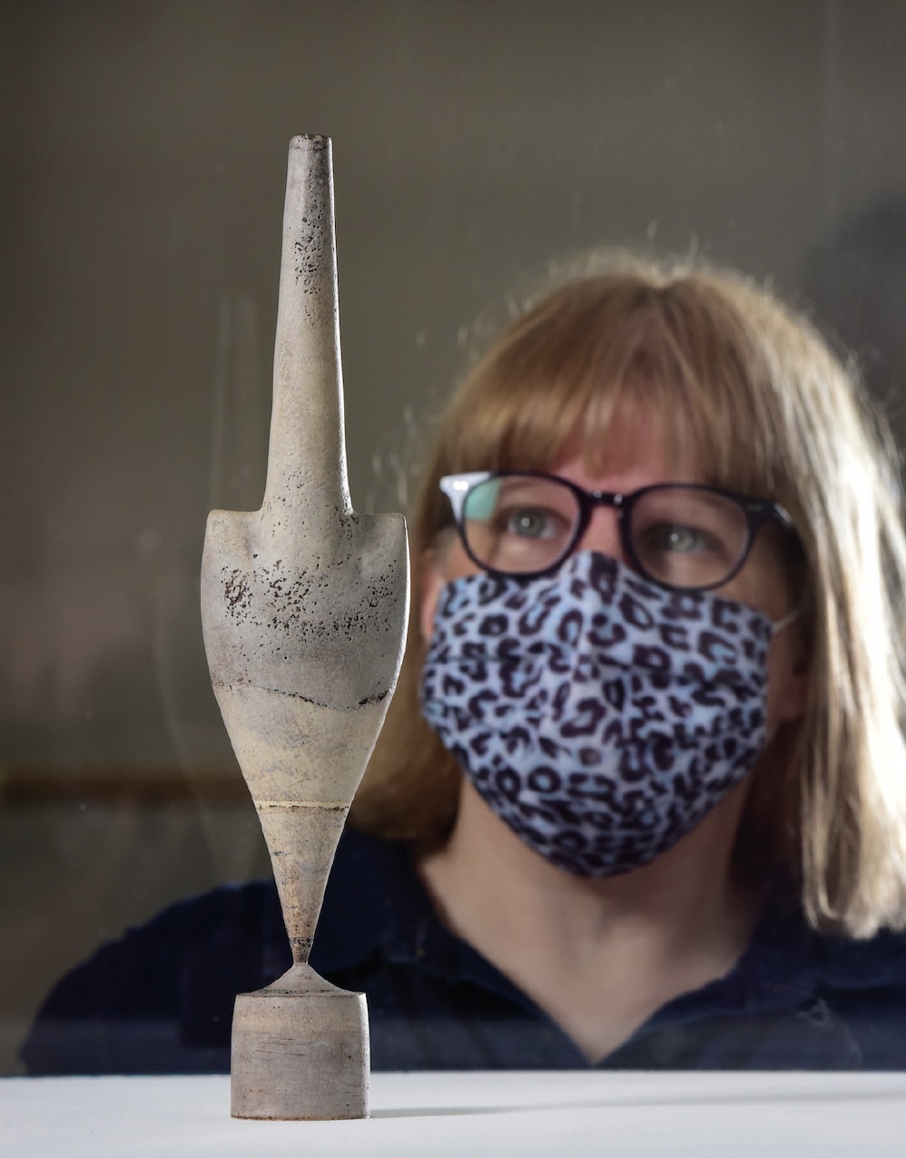 Dr Helen Walsh with Cycladic vase by Hans Coper