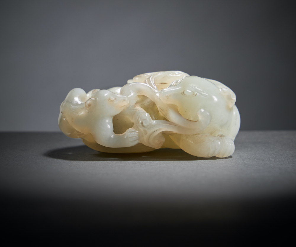 A white jade cat, 18th century