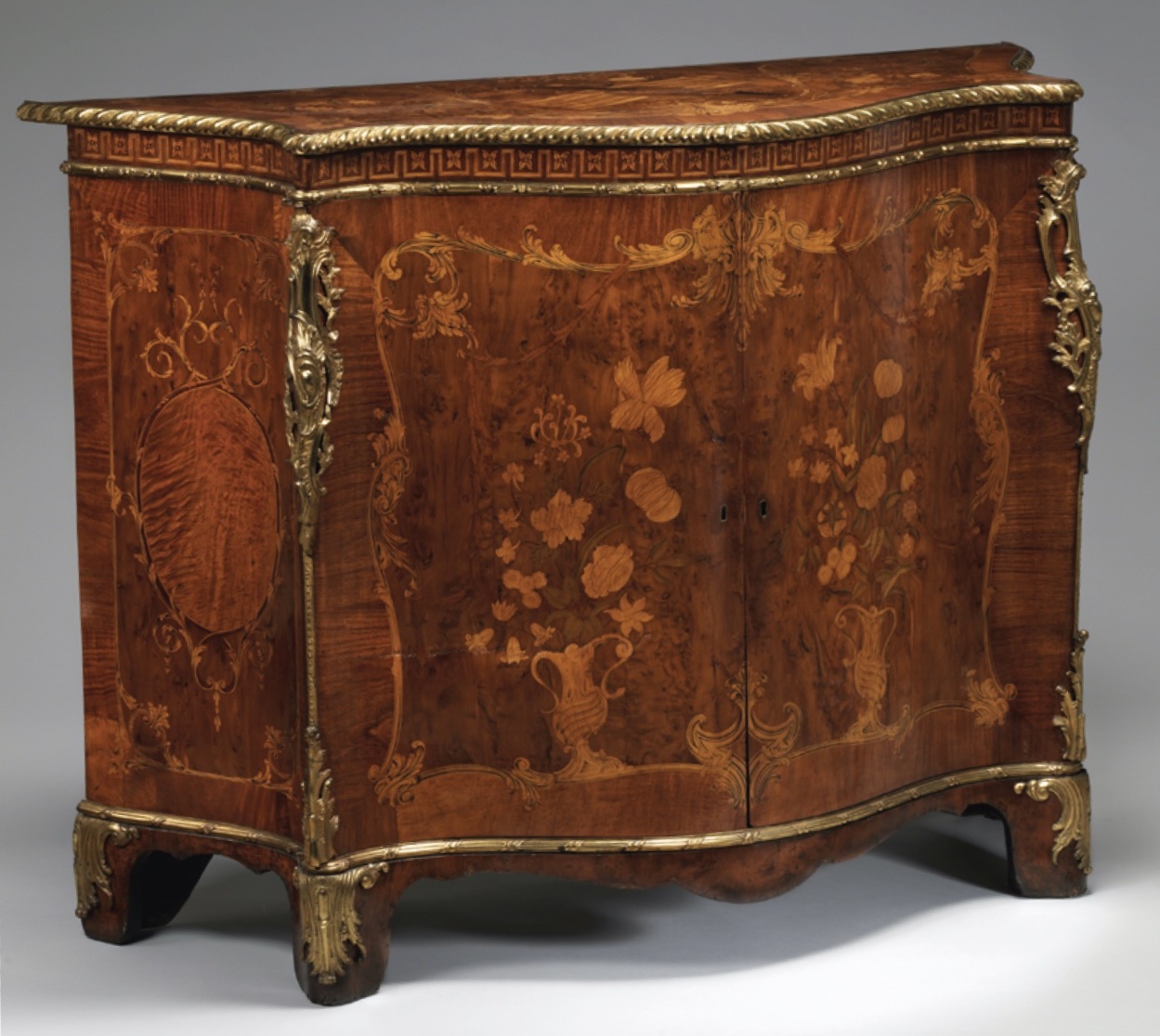 Commode, c. 1760–1770, pine veneered with satinwood and mahogany