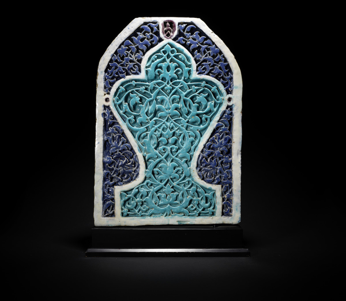 A Timurid moulded pottery mihrab tile Central Asia, second half of the 14th Century