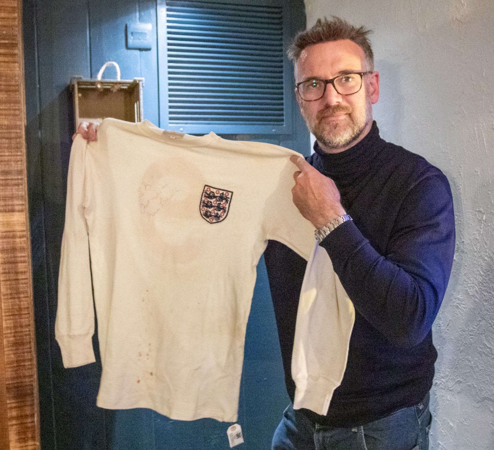 Charles Hanson, owner of Hansons Auctioneers, with the Bobby Charlton 1966 World Cup shirt
