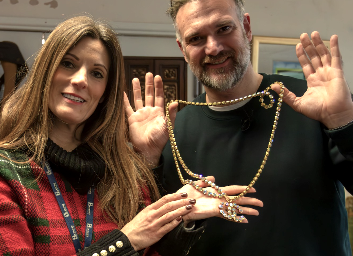 Hansons' head of jewellery Helen Smith and saleroom owner Charles Hanson with a jewellery Chanel belt