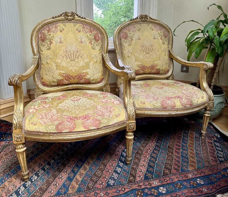 A pair of 18th-century giltwood chairs by Pope Pius XII