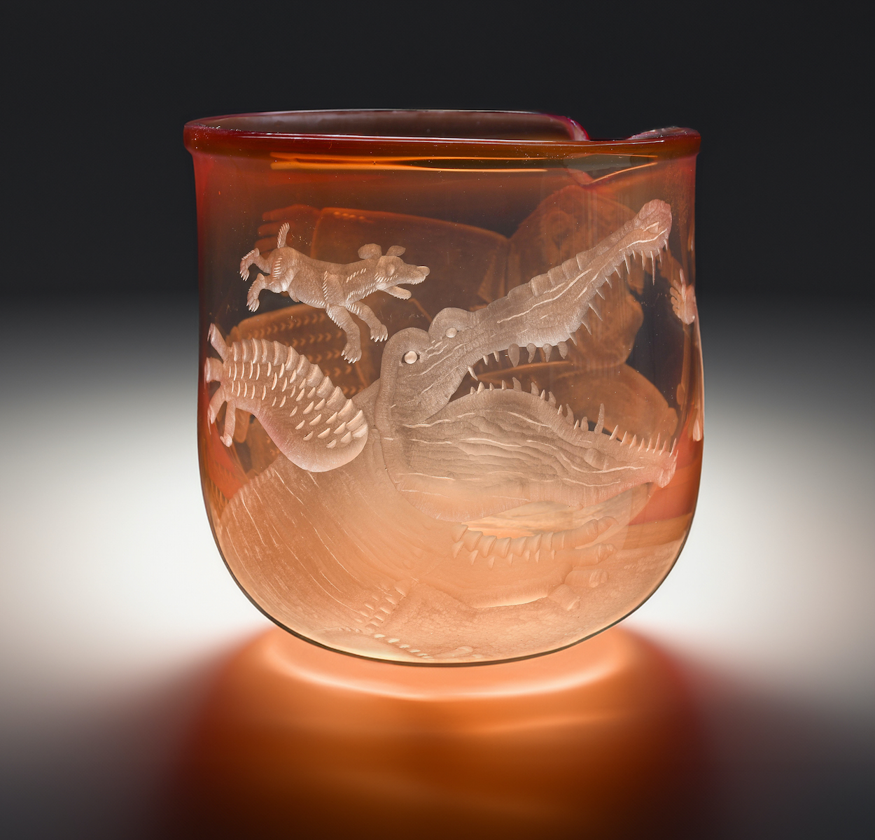 An engraved glass vase by Ronald Pennell 
