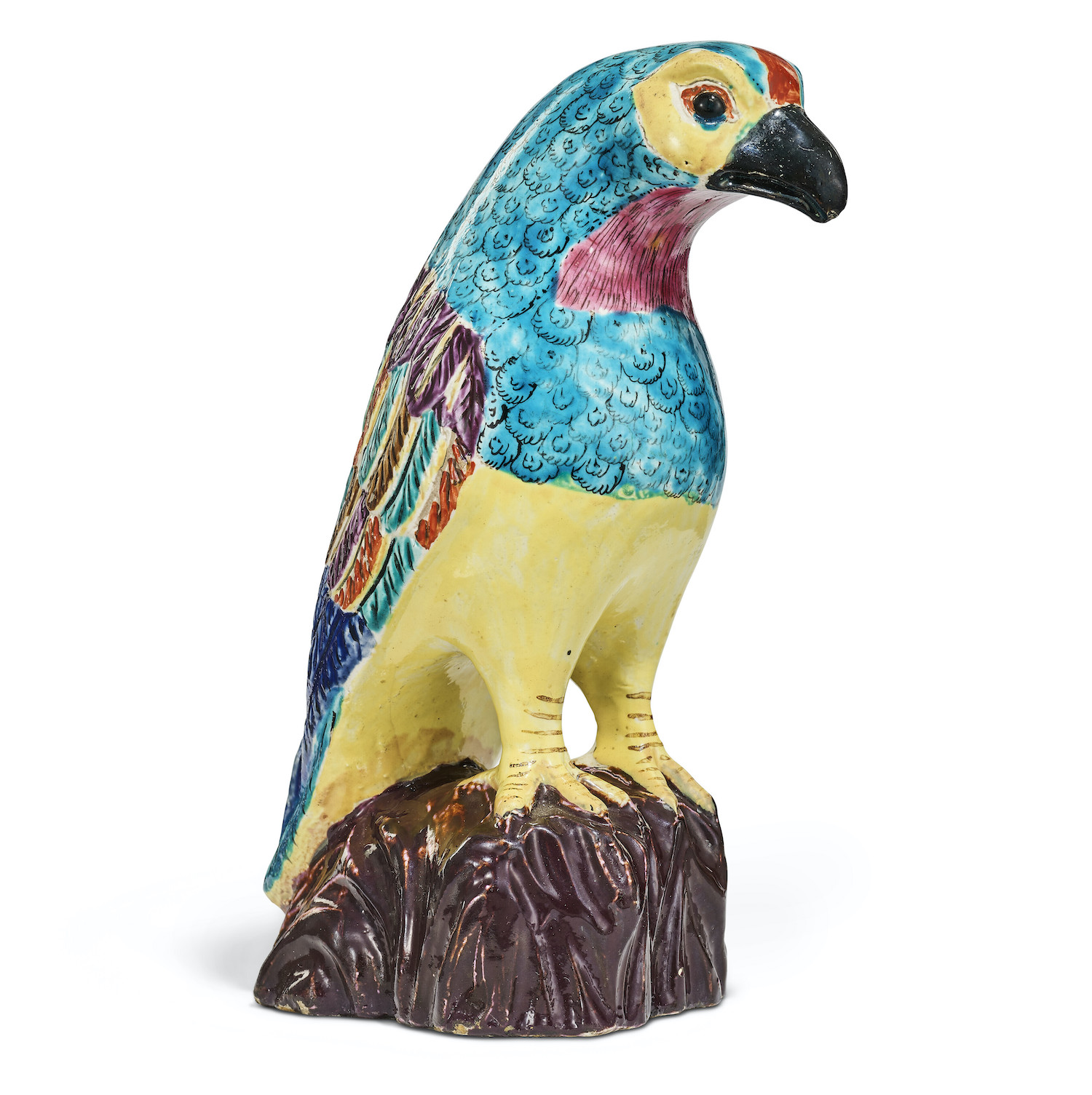 An antique Staffordshire hawk figurine