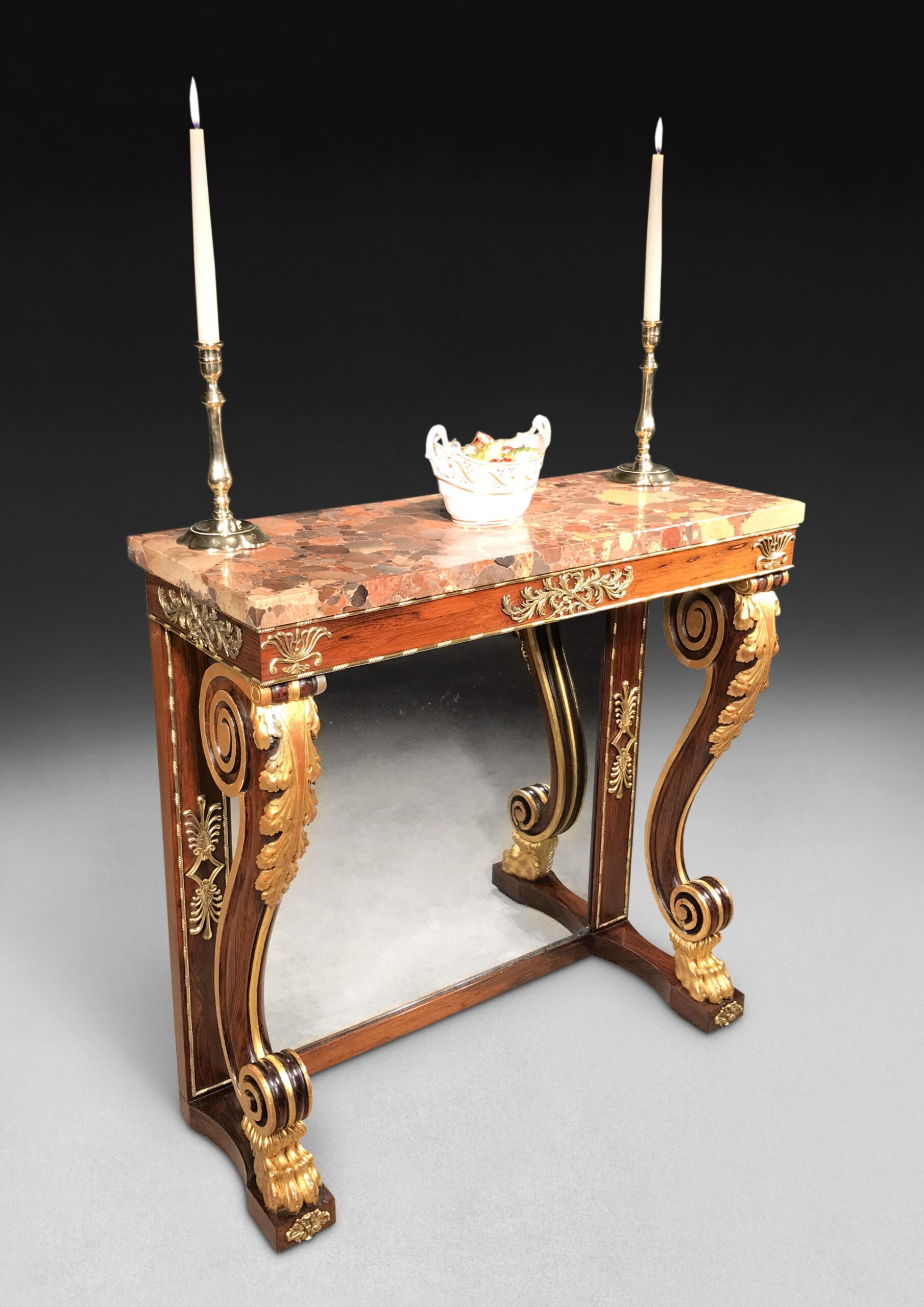 An antique Regency rosewood and gilt console table