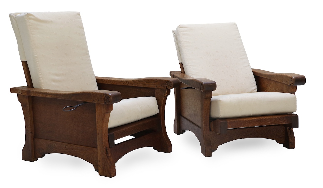 A pair of English oak easy chairs by Robert 'Mouseman' Thompson