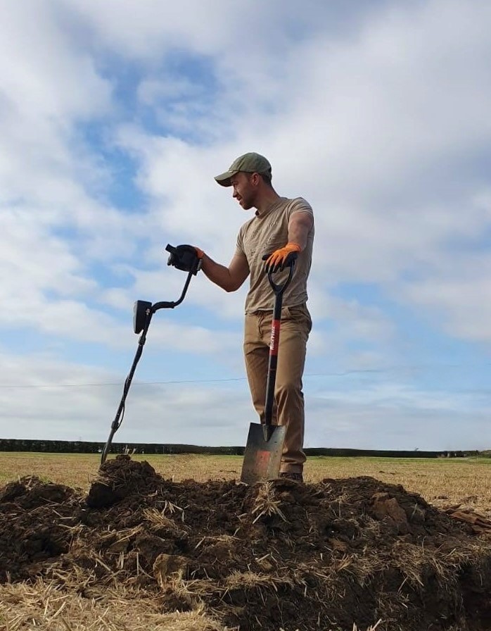 Metal detectorist George Ridgway recovering the Helmingham hoard.