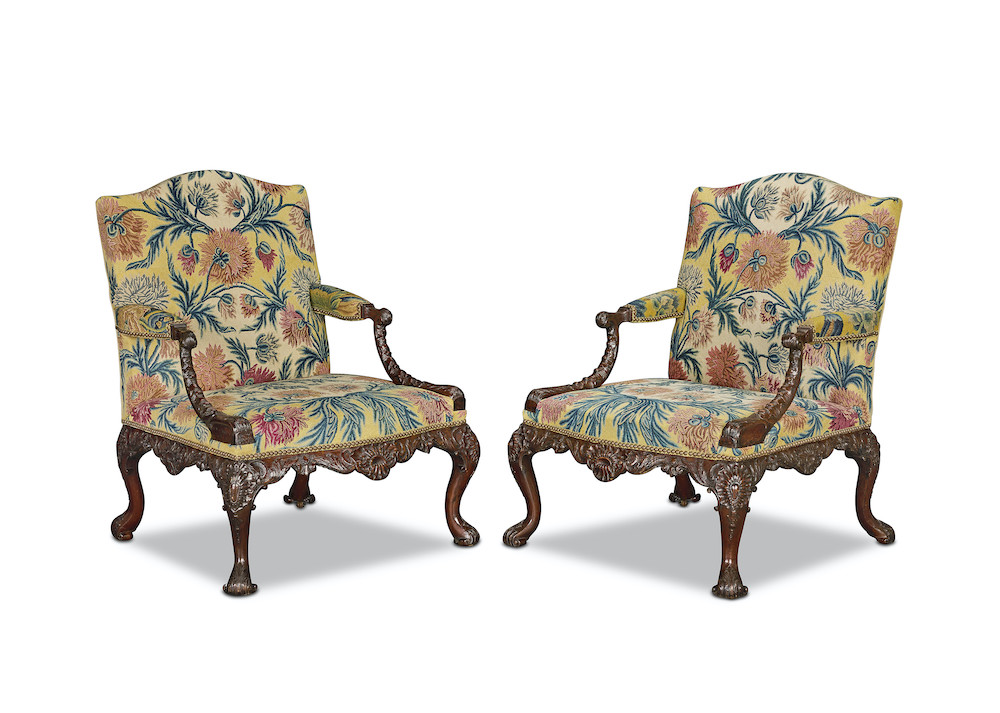 A pair of George II walnut library armchairs 1750-1755, possibly by William Bradshaw