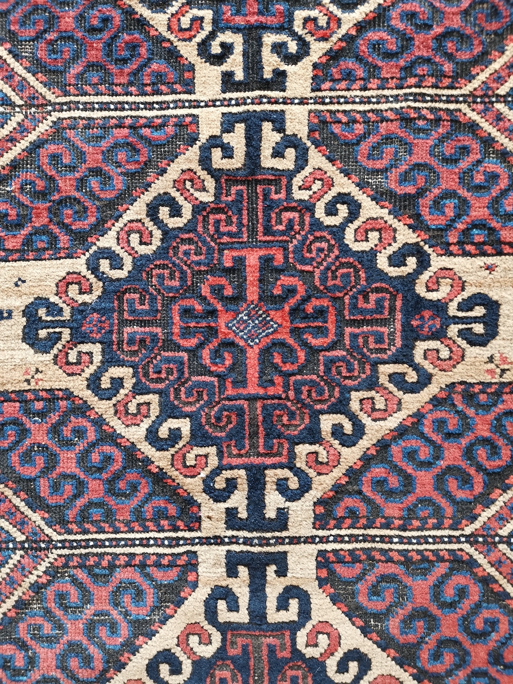 An antique Belouch rug