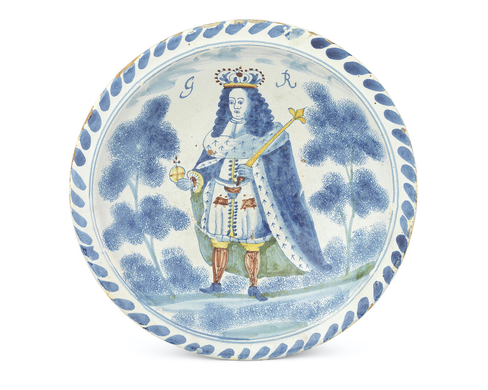 An English delftware charger, blue dash rim, circa 1714
