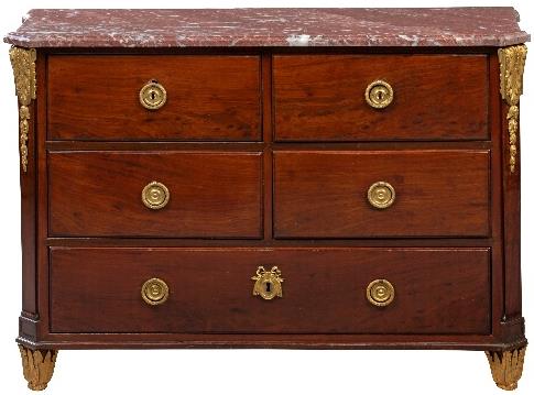A Louis XVI ormolu-mounted mahogany commode by Jean-Henri Riesener, c. 1775, estimated at £20,000-30,000. Collection of the Viscount Wimborne