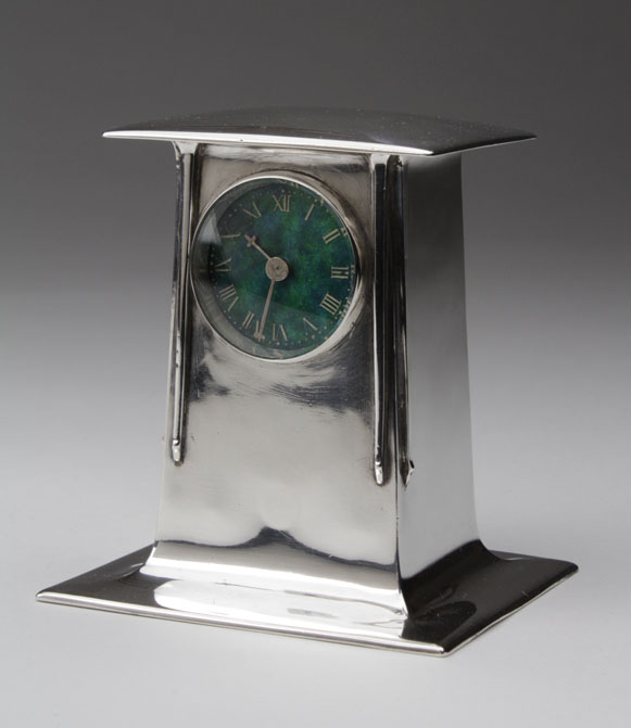 A Liberty & Co Cymric clock designed by Archibald Knox