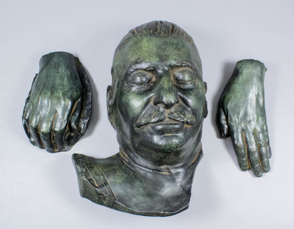 The Stalin death mask and hands in bronze