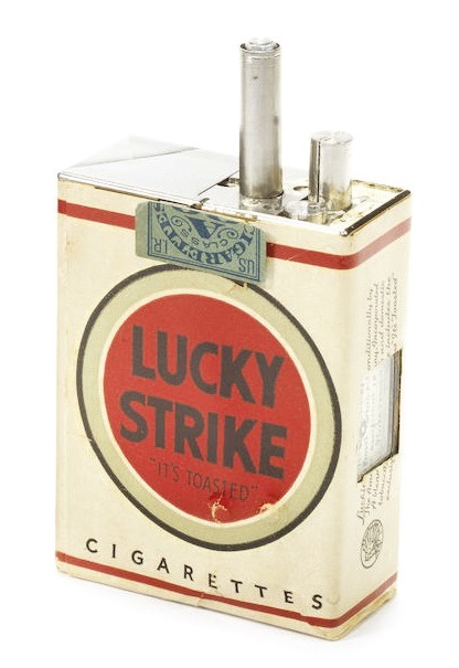 Spy gadgets include this camera disguised as Lucky Strike cigarettes