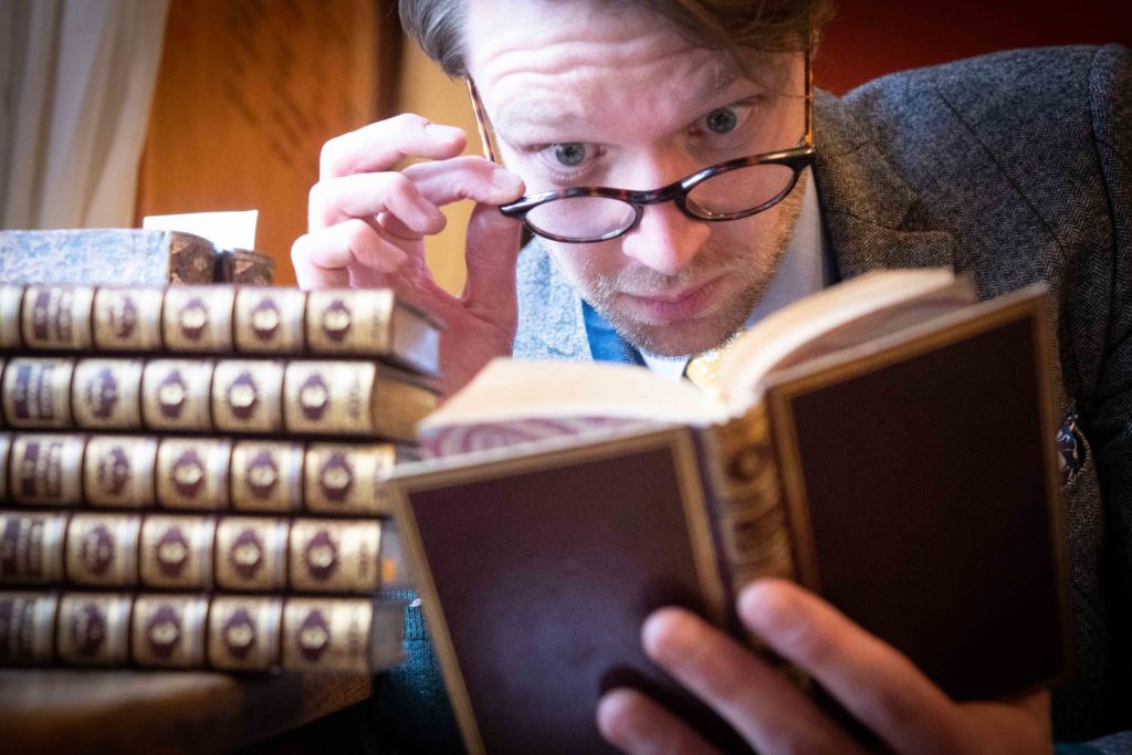 Jim Spencer with Marquis de Sade books