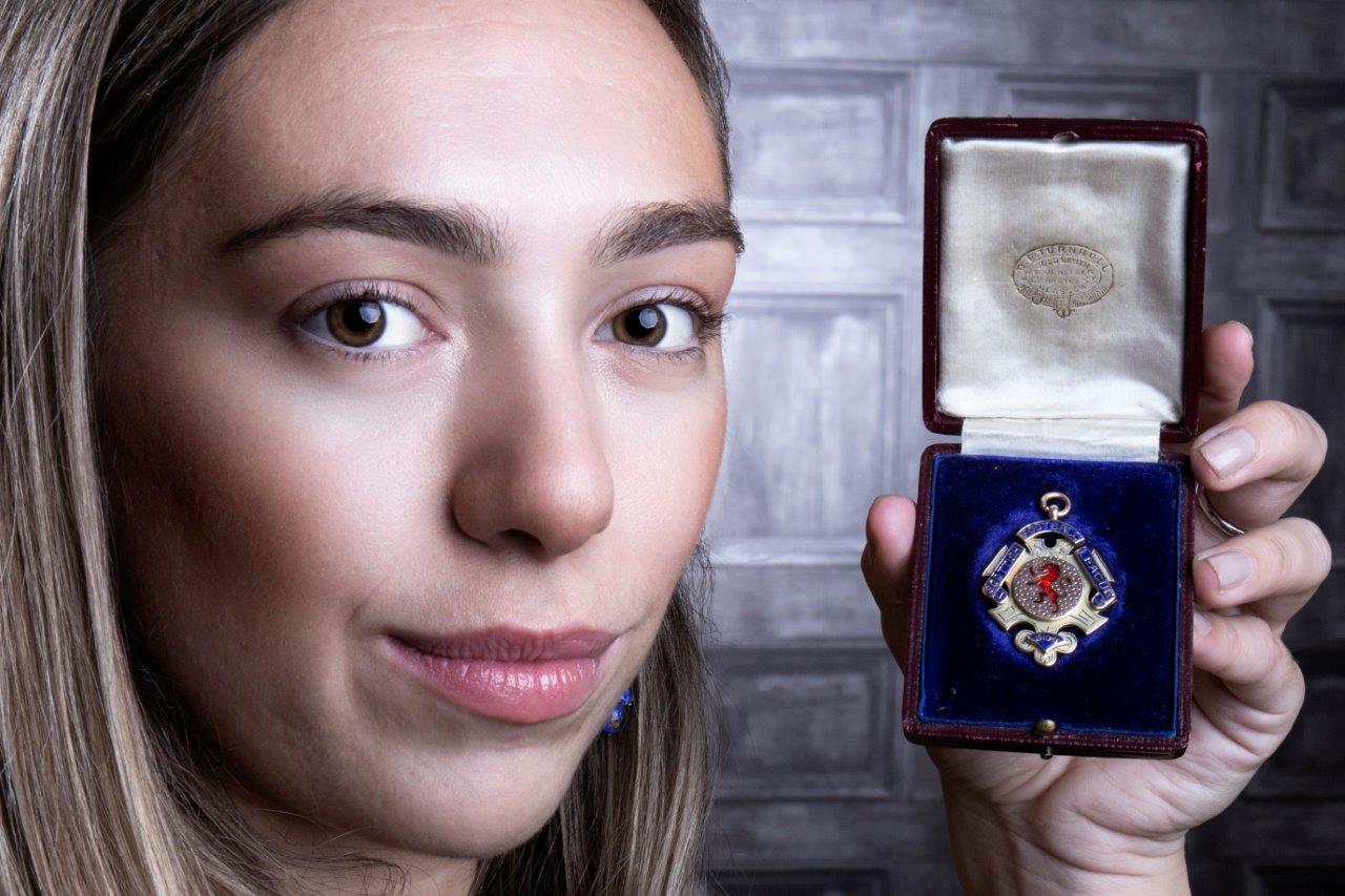 Hannah Murphy from McTear's with Joe Hendry's League Championship medal from season 1910-11 - pic Ken McArthur (2)