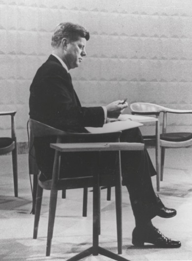 John F Kennedy sitting on Hans J. Wegner’s JH501 chair