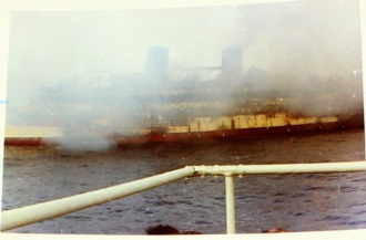 Lakonia on fire, picture by crew member of the Montcalm rescue ship